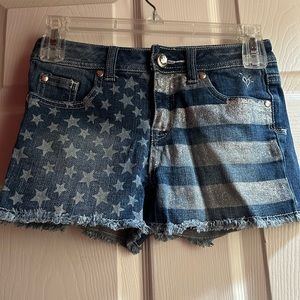 Girl’s jean shorts with Stars and Stripes.